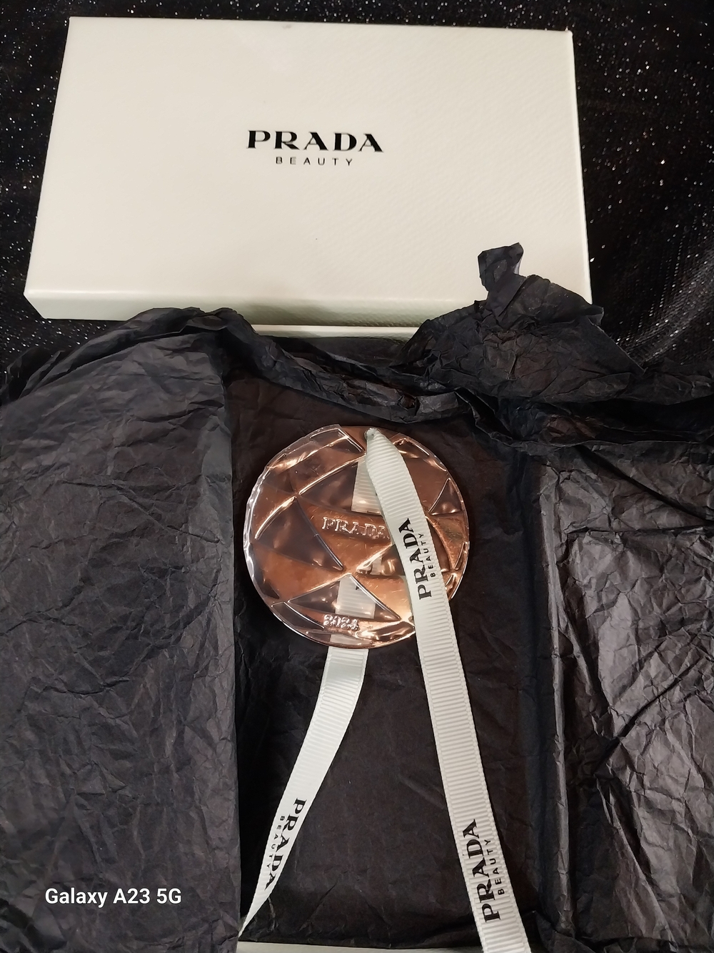 PRADA Beauty 2024 Christmas Campaign Silver Geometric Disc Ornanent Mint Ribbon